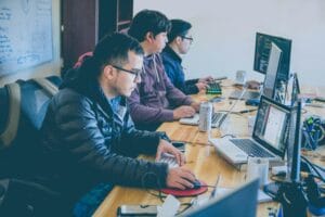 Corporate analysts executing virtual database efficiency tuning across server storage layers