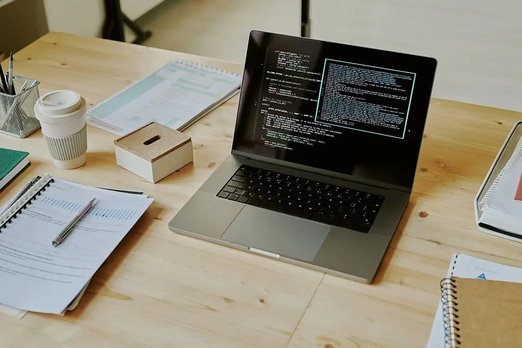 Clean minimalist developer workspace illustrating github copilot vs cursor composer workflow comparison on a screen.