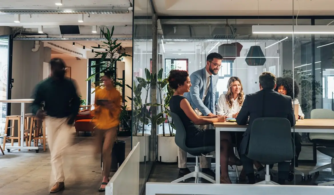Business team using AI Knowledge Management Systems to share information and collaborate