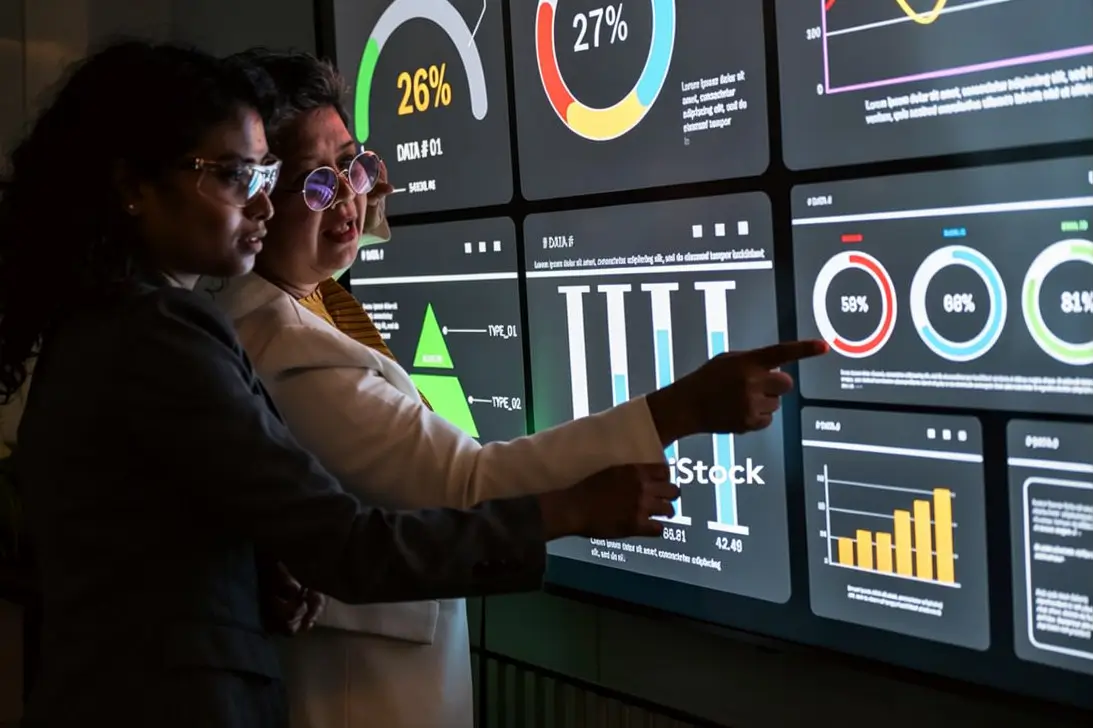 Business team reviewing enterprise AI cost management dashboard