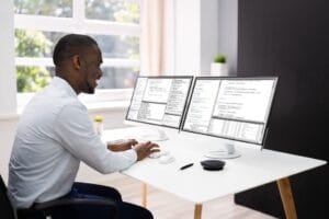 Programmer debugging a project after a build failure